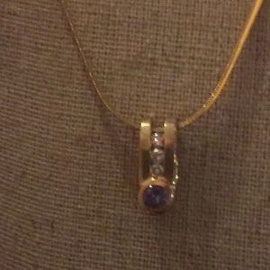 Tanzanite and diamond pendant with 9 grams this gem will be a exclusive